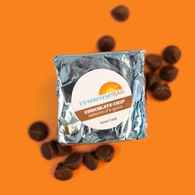 Load image into Gallery viewer, Yummmm!bar mini chocolate chip snack bar packaging with chocolate chips on an orange background