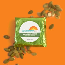 Load image into Gallery viewer, Yummmm!bar mini pumpkin seed snack bar packaging with chocolate chips on an orange background